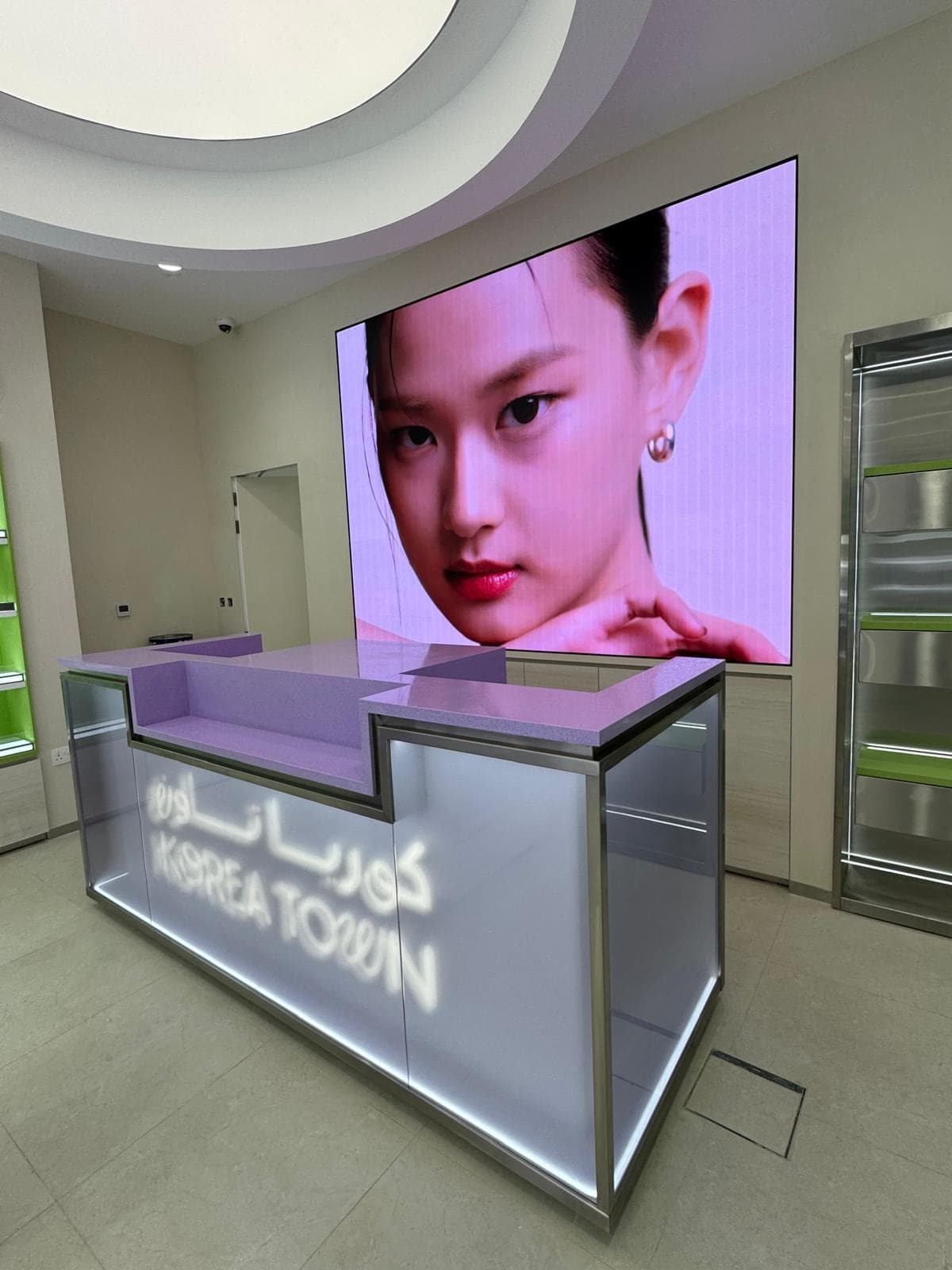 Korea Town Hessa Mubarak — Cash desk: Backlit counter and LED wall